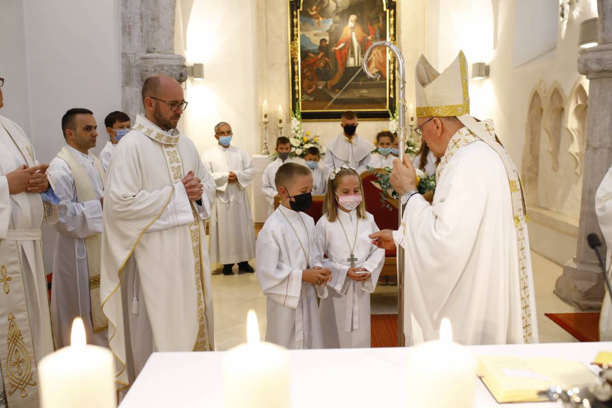 Proslava sv. Augustina i krštenje petog djeteta roditelja Stožicki u Velikoj